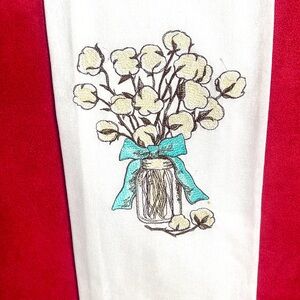 Mason Jar Filled with Cotton Embroidered Hand Towel